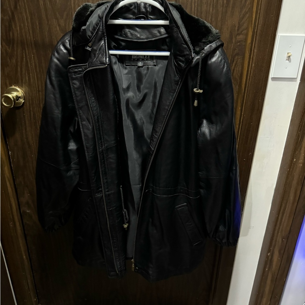 Leather jacket with removable lining.